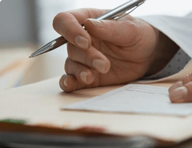 Doctor writing prescription