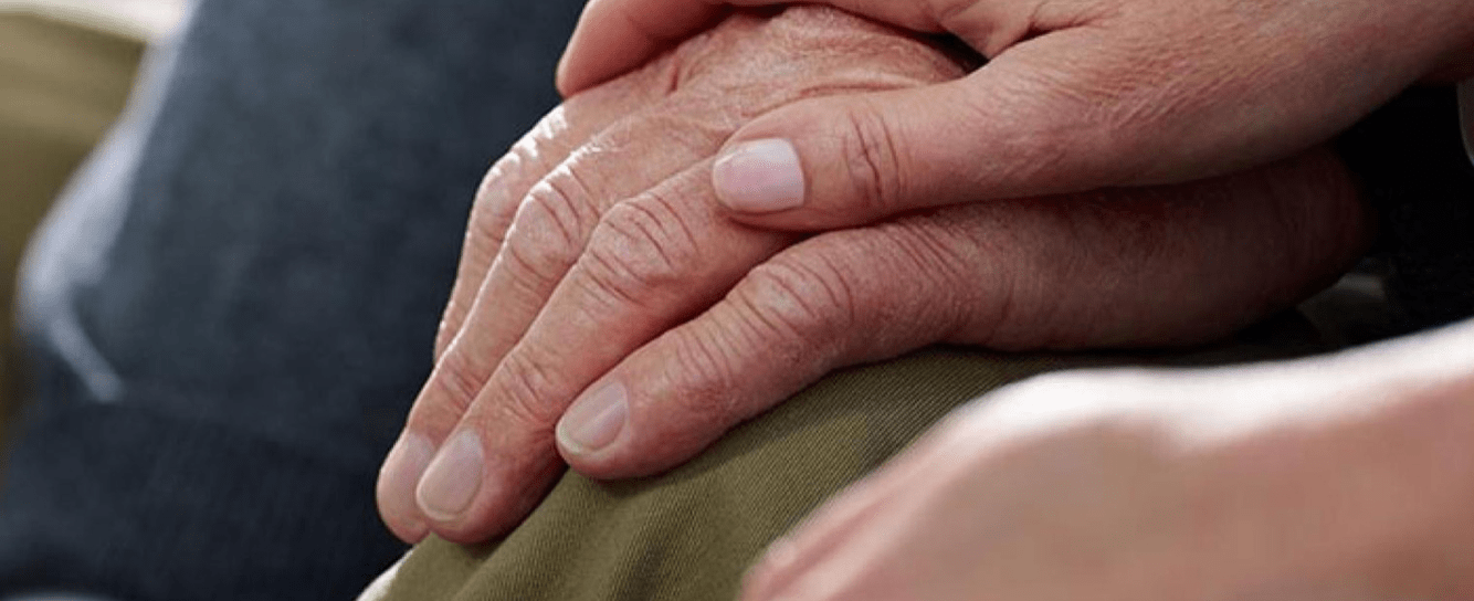 Couple holding hands