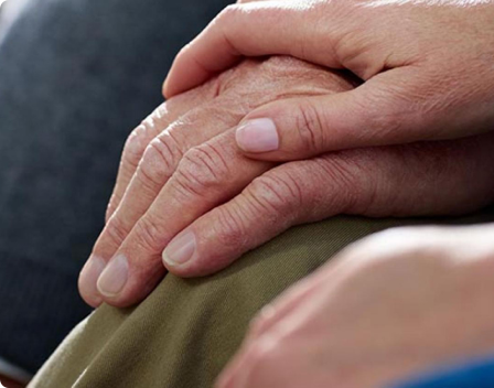 Couple holding hands