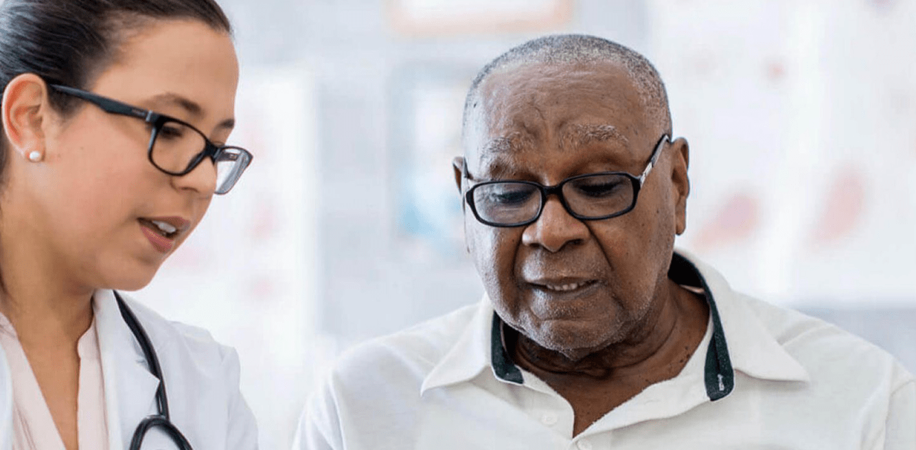 Doctor speaking with patient