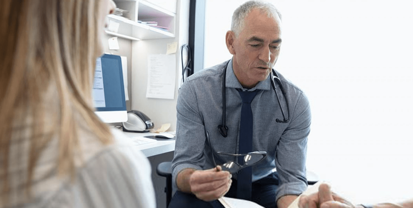 Doctor speaking with patients