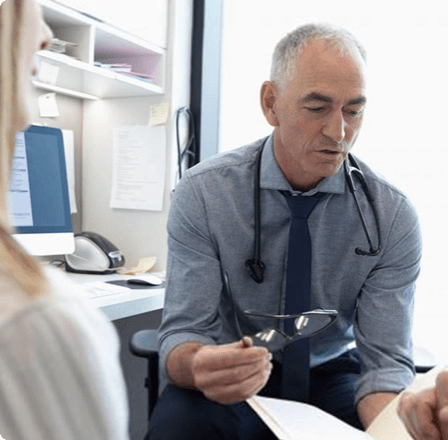 Doctor speaking with patients