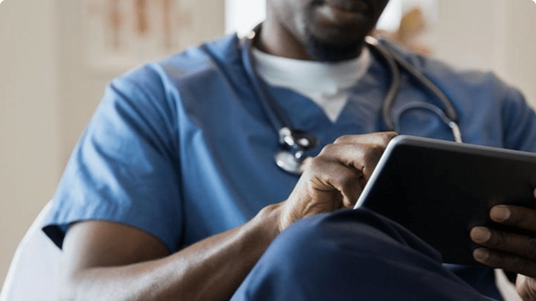 Doctor using iPad