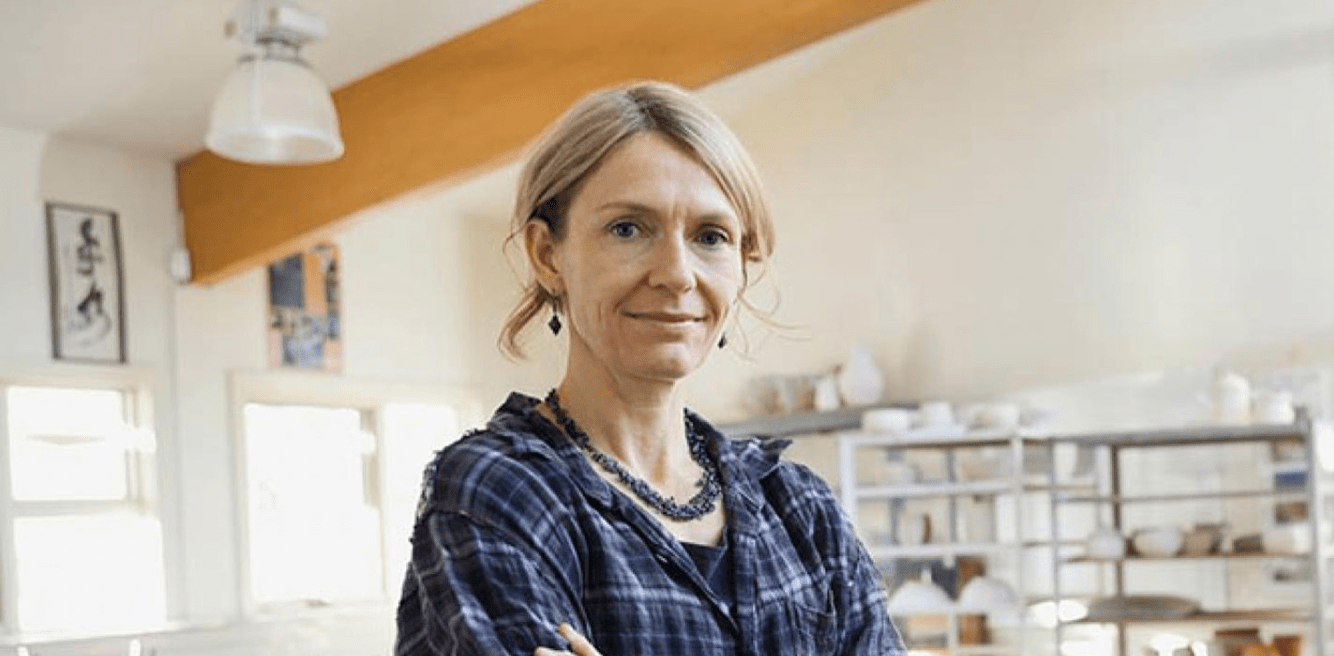 Lady looking at the camera with crossed arms