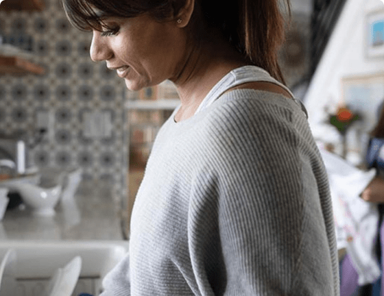Two women in the kitchen area
