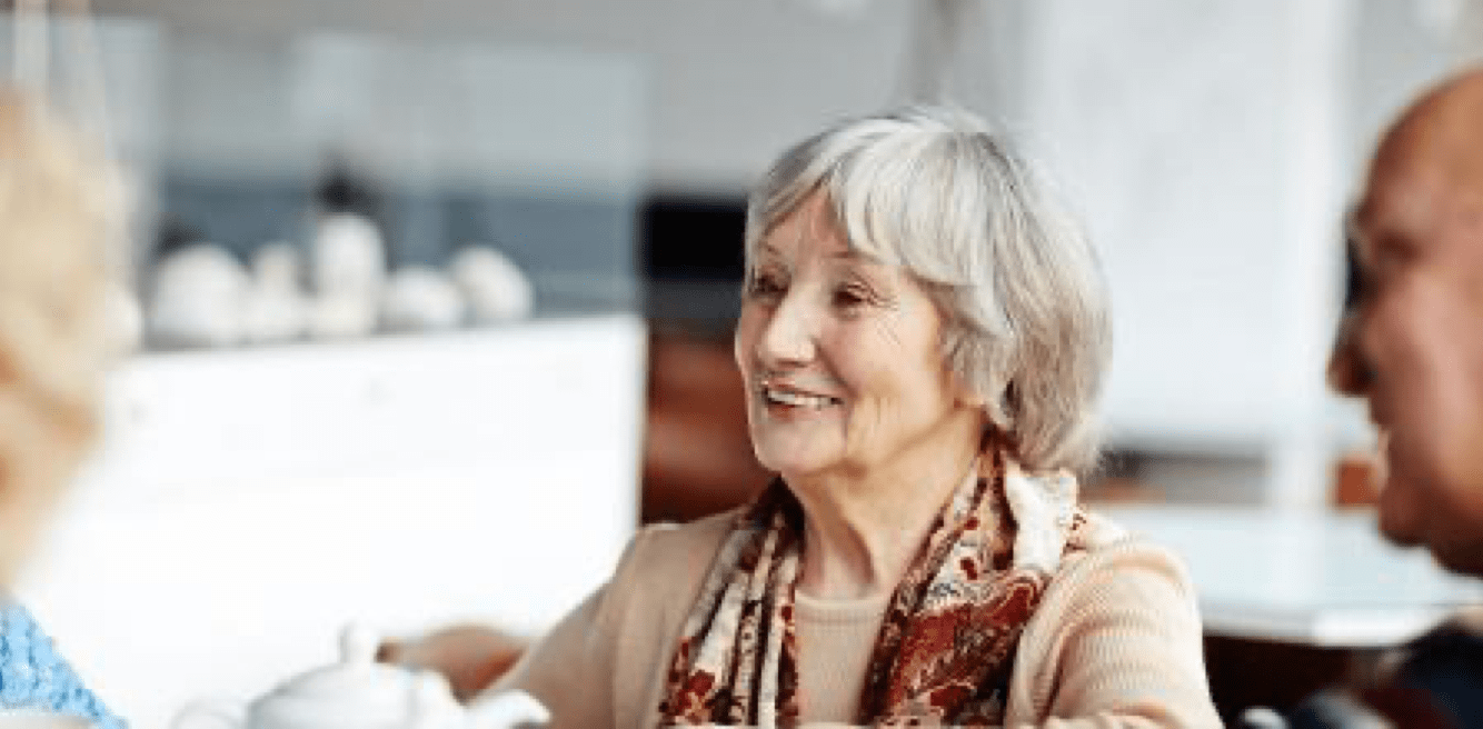 Woman smiling in a cafe